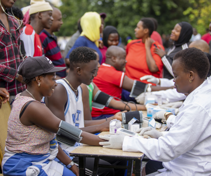 A Group of People Getting Medical Checkups Outside